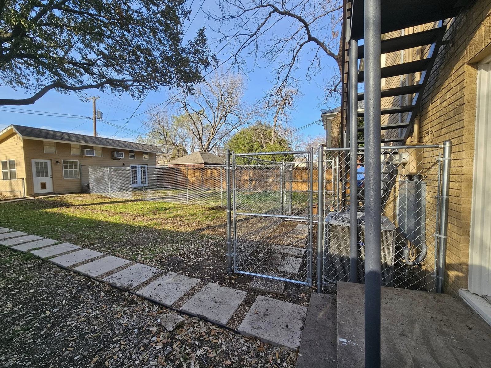 Property boundary before wood privacy fence installation